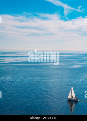 Amazing capture of a sailing boat taken from Cape Sounion, southeast Athens. Stock Photo