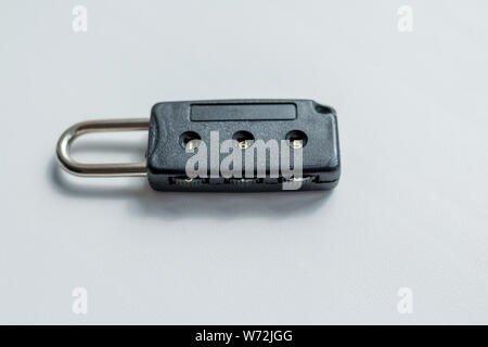 Combination padlock isolated on white background.Travel and safety concept with padlocks on a luggage.luggage padlock for suitcases and bags. Number Stock Photo