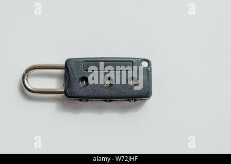 Combination padlock isolated on white background.Travel and safety concept with padlocks on a luggage.luggage padlock for suitcases and bags. Number Stock Photo