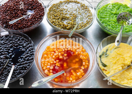 Ingredients used in Vietnamese Street Food arranged on a Stainless Steel Trolley Stock Photo
