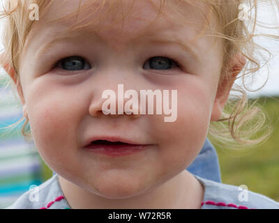 Close up image of a one year old's face, UK Stock Photo