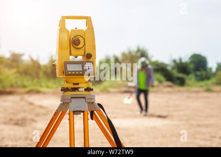 Land checking : Surveyor engineer making measure at the land Stock Photo