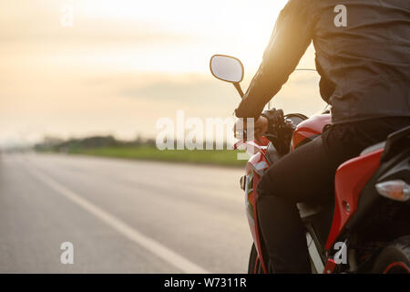 biker man black leather jacket and motorcycle helmet in Chicago, IL, USA  Stock Photo - Alamy