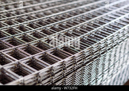 Metal grid. Heavy industry production. Metal rolling plant Stock Photo