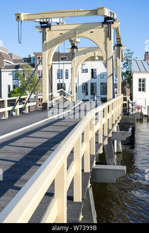 The Rembrandtbrug (Rembrandt Bridge) in Leiden, The Netherlands. It is a double wooden drawbridge in the inner city. Stock Photo