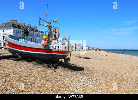 Colourful fishing boat on the beach in pretty Deal, in Kent, SE England, UK Stock Photo