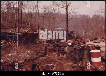 VIEW OF WASTE MATERIALS WHICH HAVE ACCUMULATED AROUND THE MINE OF GEORGE WILSON NEAR WILDER AND COOKEVILLE, TENNESSEE. HIS BROTHER-IN-LAW MINE WAS CLOSED BY FEDERAL MINE INSPECTORS BECAUSE IT LACKED A NON-ARCING DRILL. WILSON SAID IT WOULD COST HIM $100,000 TO BUY THE NECESSARY EQUIPMENT TO GO BACK INTO BUSINESS. THE MINE PRODUCED 250 TONS OF COAL A DAY FOR HOME HEATING AND THE TENNESSEE VALLEY AUTHORITY Stock Photo