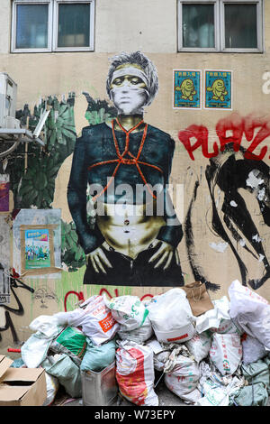 Street art on a wall in Sheung Wan, Hong Kong Stock Photo