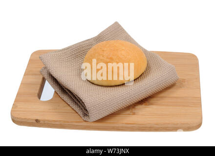 round breads on cutting board isolated on white Stock Photo