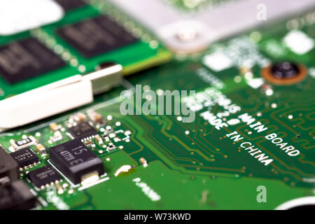 Trade war , Made in CHINA and industry technology concept. Selective focus on text screen on the production of printed circuit boards (PCB). Factory m Stock Photo