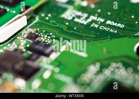 Trade war , Made in CHINA and industry technology concept. Selective focus on text screen on the production of printed circuit boards (PCB). Factory m Stock Photo