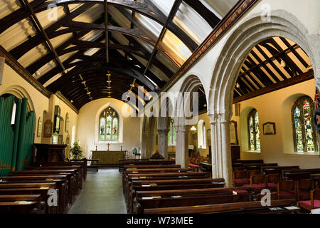 Interior of Anglican St Just's Church with stained glass windows and pipe organ St Just in Roseland Cornwall England Stock Photo