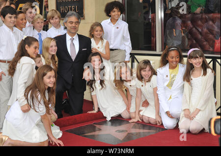 LOS ANGELES, CA. March 02, 2010: Andrea Bocelli with the children from the  Adderley School of Performing Arts, on Hollywood Boulevard where he was  honored with the 2,402nd star on the Hollywood Walk of Fame. © 2010 Paul  Smith / Featureflash