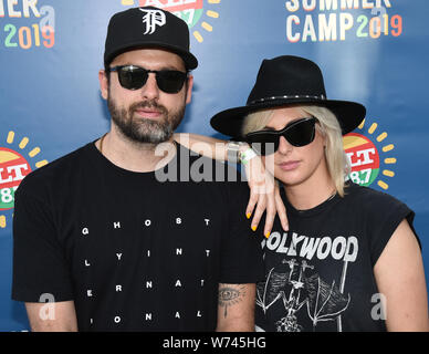 Long Beach, California, USA. 3rd Aug 2019. Josh Carter and Sarah Barthel of the band Phantogram pose for a portrait backstage ALT 98.7 Summer Camp at the Queen Mary Event Park in Long Beach on August 3, 2019. Credit: The Photo Access/Alamy Live News Stock Photo