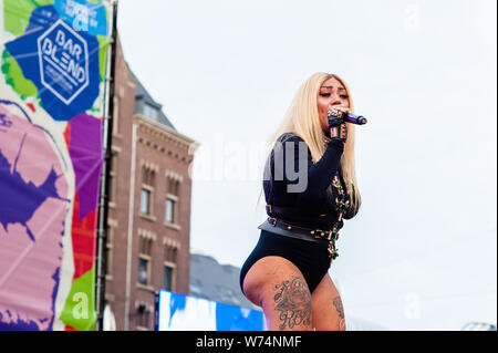 Amsterdam, Netherlands. 04th Aug, 2019. Mutya Buena is seen giving a concert during the party. The former member of the Sugababes, Mutya Buena, gave a performance during the final concert of the Pride Amsterdam at the Dam square, in the center of the city. On Sunday, the official end - party, where there is always a colourful collection of artists enters the stage. Credit: SOPA Images Limited/Alamy Live News Stock Photo