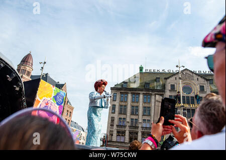 Amsterdam, Netherlands. 04th Aug, 2019. Drag queen Victoria False, is seen giving a performance on the stage. The official end - party where there is always a colourful collection of artists enters the stage took place at the famous Dam square in Amsterdam. This year's performances of Conchita, Mutya Buena, Netta, Paul Morris, Mayré Martinez, Channah Hewitt, etc and hosting by one of the Pride ambassadors, Amber Vineyard. Credit: SOPA Images Limited/Alamy Live News Stock Photo