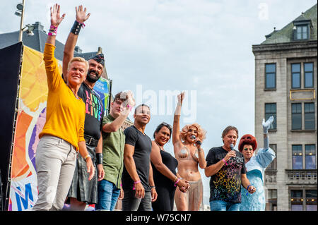 Amsterdam, Netherlands. 04th Aug, 2019. Ambassadors of the Pride Amsterdam of this year are seen on the stage. The official end - party where there is always a colourful collection of artists enters the stage took place at the famous Dam square in Amsterdam. This year's performances of Conchita, Mutya Buena, Netta, Paul Morris, Mayré Martinez, Channah Hewitt, etc and hosting by one of the Pride ambassadors, Amber Vineyard. Credit: SOPA Images Limited/Alamy Live News Stock Photo