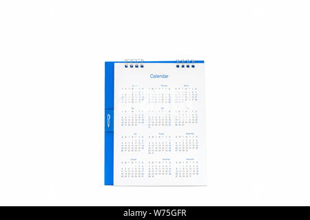 White paper desk spiral calendar isolated on white background. Stock Photo