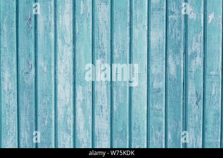 Turquoise vertical wooden planks. Blue, light green painted wood background. Vintage pattern for decorative design.  Old table. Grain timber texture. Stock Photo