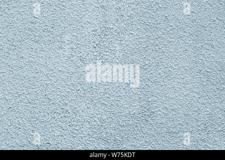 Gray concrete wall with stucco in vintage style. Whitewash rough surface. Abstract grunge texture. Stone background. Old dirty cement wall, pattern. Stock Photo