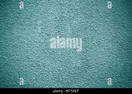 Muted Teal Stucco Wall Texture Background, Rough Painted Plaster Surface with Fine Grain Pattern, Minimal Greenish Blue Architectural Backdrop for Des Stock Photo