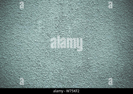 Gray and light green painted concrete wall, stucco textured. Modern grunge background. Decorative rough  pattern. Grunge surface with vignette. Dirty Stock Photo