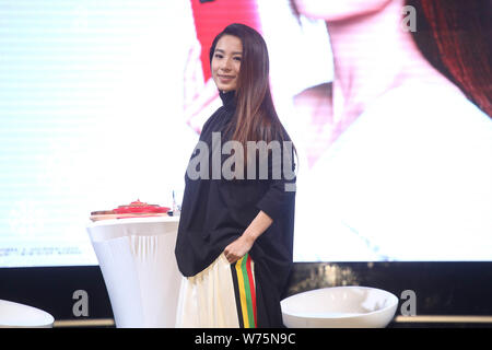 **TAIWAN OUT**Taiwanese singer and actress Hebe Tien or Tien Fu-chen of Taiwanese girl group S.H.E attends a promotional event for OPPO R9s smartphone Stock Photo