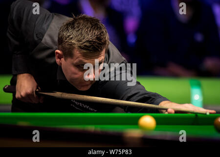 Ryan Day of Wales plays a shot to Shaun Murphy of England in their semi-final match during the 2017 Betway UK Championship snooker tournament in York, Stock Photo