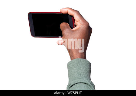 Arm of an African American Man taking Photo by mobile Device and touching mobile Phone Display isolated on white Background Stock Photo