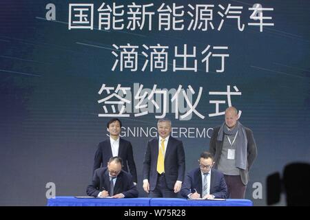 Jiang Dalong, back center, chairman of National Electric Vehicle Sweden (NEVS), and guests attend the signing ceremony between NEVS and Didi Chuxing o Stock Photo