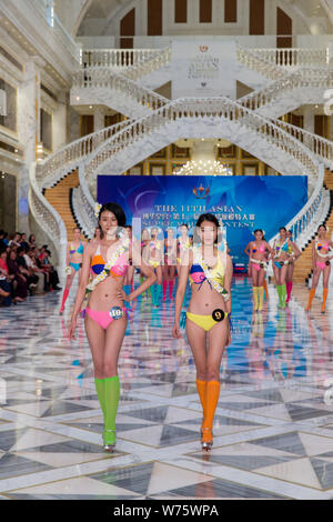 Contestants display creations during the 11th Asian Supermodel Contest at Imperial Palace in Saipan, Northern Mariana Islands, 16 December 2017.   A t Stock Photo