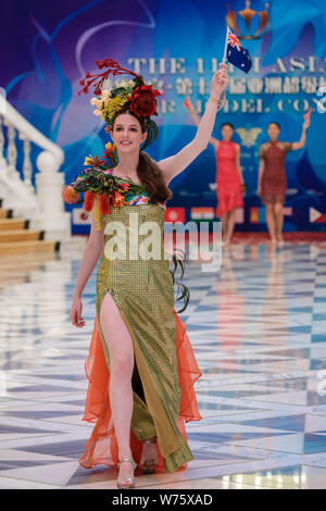 A contestant displays a creation during the 11th Asian Supermodel