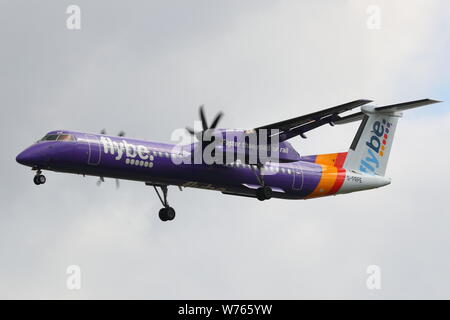 Flybe De Havilland Canada Dash DHC-8 400 G-PRPE landing at Birmingham Airport, UK Stock Photo