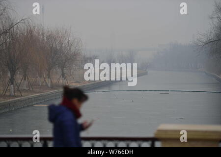 Download A Pedestrian Wearing A Face Mask Walk Past The French Christian Dior Luxury Goods Logo Seen In Hong Kong Stock Photo Alamy PSD Mockup Templates