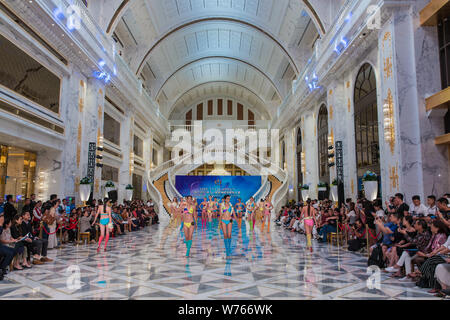 Contestants display creations during the 11th Asian Supermodel Contest at Imperial Palace in Saipan, Northern Mariana Islands, 16 December 2017.   A t Stock Photo