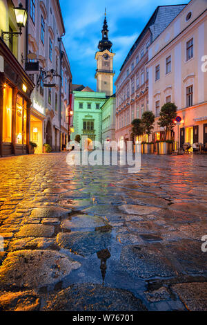 Linz, Austria. Cityscape image of old town Linz, Austria during twilight blue hour with reflection of the city lights. Stock Photo