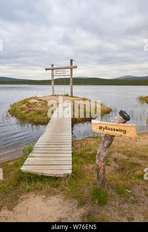 Swing at lake Äkäslompolo, Kolari, Lapland, Finland Stock Photo