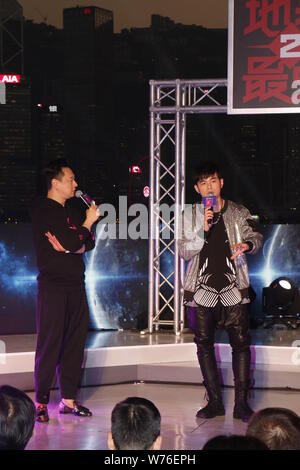 Taiwanese singer Jay Chou, right, attends a press conference for 'The Invincible 2' Jay Chou Concert Tour 2018 in Hong Kong, China, 8 December 2017. Stock Photo