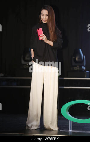 **TAIWAN OUT**Taiwanese singer and actress Hebe Tien or Tien Fu-chen of Taiwanese girl group S.H.E attends a promotional event for OPPO R9s smartphone Stock Photo