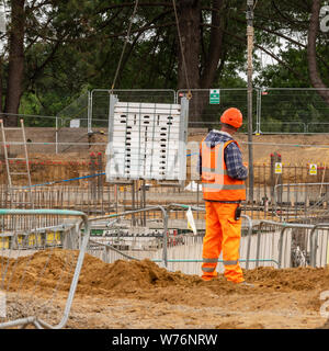 Building work on a commercial construction site Stock Photo