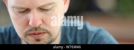 Sad and Overwhelmed Bearded Man Close-up Portrait Stock Photo