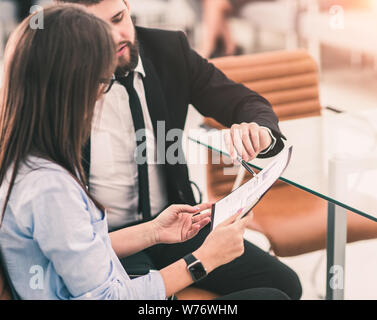 successful business team is analyzing marketing reports at the w Stock Photo