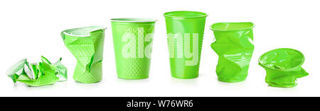 Green plastic cups isolated on white background Stock Photo
