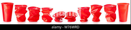 Red crumpled plastic cups isolated on white background Stock Photo
