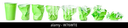 Green crumpled plastic cups isolated on white background Stock Photo