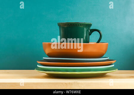 Glassware. Glass plates, cups, bowls Dishes on the shelf Kitchenware Stock Photo