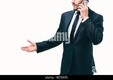 businessman is engaged in a dialogue on a cell phone Stock Photo