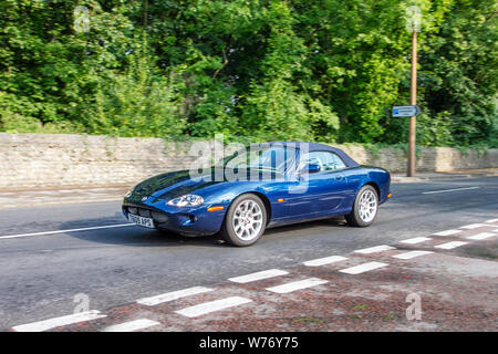1999 Jaguar XKR Auto en-route to Lytham Hall classic vintage collectible transport festival vehicles show. The Festival of Transport will see a diverse range of classic, vintage and prestige vehicles on display. Stock Photo