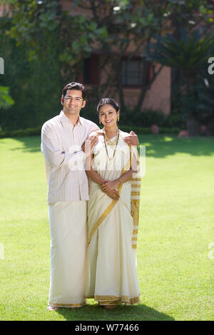 South Indian couple standing together Stock Photo - Alamy