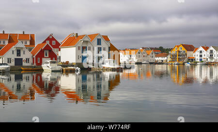 Marina in the Norwegian town Skudeneshavn. Old Skudeneshavn is one of the most well kept old towns of Europe and a quiet harbour for tall ships and sm Stock Photo